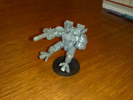 Converted Tau battlesuit commander by Keecai