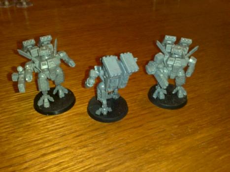 Converted Tau Battlesuit crisis team by Keecai