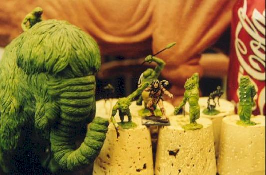 28mm greens woolly mammoth (tusks still being made), and cavemen by Kaonis Productions