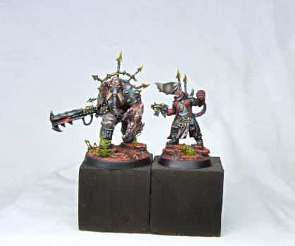 Traitor Commissar and  Chaos Ogryn by pentafigs