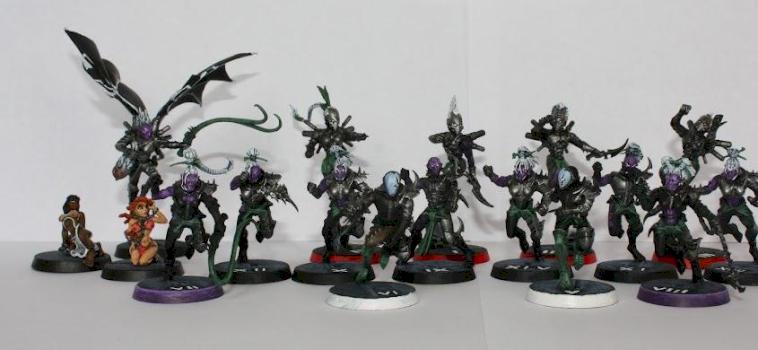 Dark elf team adapted from Dark Eldar Wyches, Scourges and slaves by Jasper Winkel