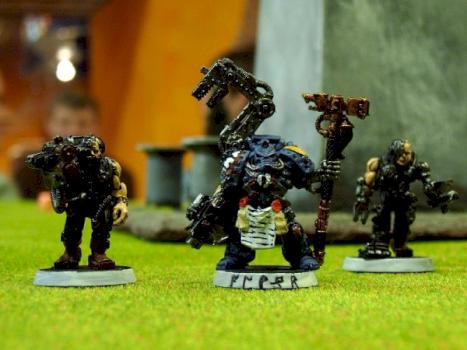 Iron Priest with Servitors by Kjalter