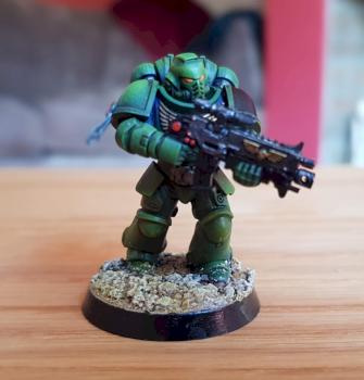 My first ever painted mini - Primaris marine done in sort of Salamander colours by WallBall