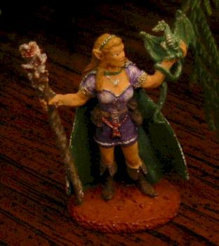 Lady and her pseudodragon by kaeledra