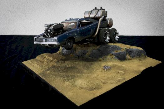 MAD MAX TRUCK BOUNCES ALONG THROUGH THE DESERT by Jeanette