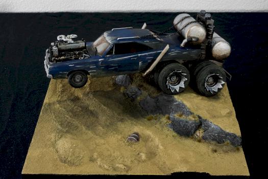 MAD MAX TRUCK BOUNCES ALONG THROUGH THE DESERT by Jeanette