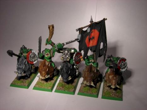 orcs on wild pigs by mushroom