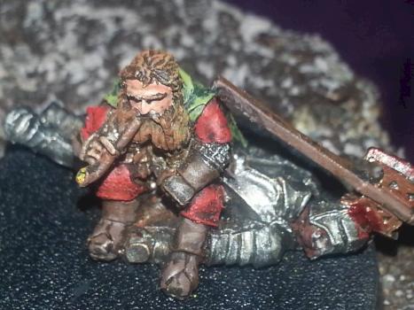 Gimli on Dead Uruk Hai by miniatureman