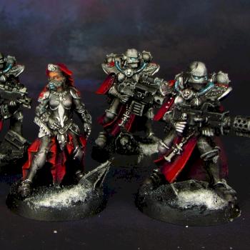 Sisters of Battle Sister Hospitalier with Battle Sisters squad by Awaken Realms