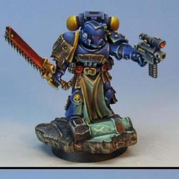 Ultramarine sergeant with chainsword and bolt pistol on sculpted base by Wappellious