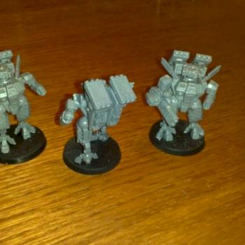 Converted Tau Battlesuit crisis team by Keecai