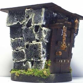 mordheim building by bretonian man