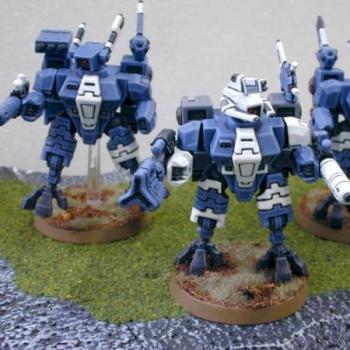 Tau Battle Suit Comander with bodyguard by striker8
