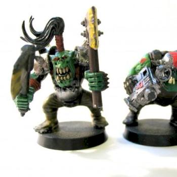 Two orks by SzurixHUN