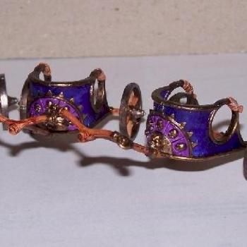 Three unfinished chariots by Sippe