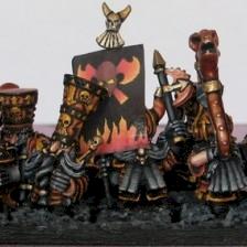 A Unit of Chaos Dwarfs with Great weapons and a hero within by xyz234
