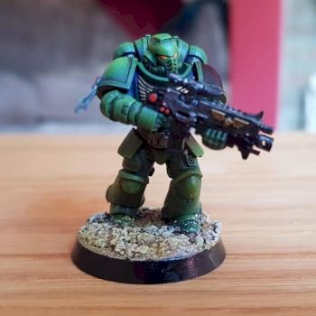 My first ever painted mini - Primaris marine done in sort of Salamander colours by WallBall