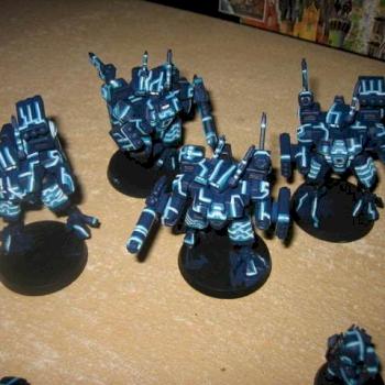 Tron Tau Crisis suits by scharling