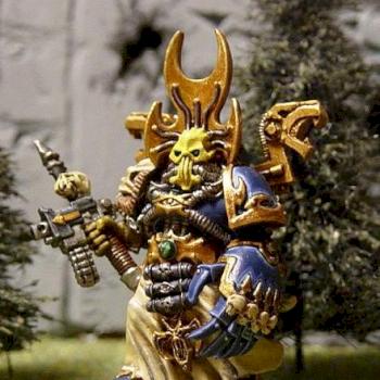 Thousand sons sorcerer with power fist by fire angel
