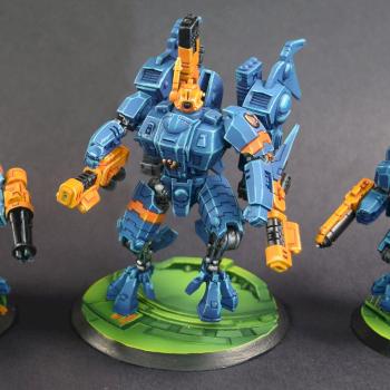 Tau Commander and Crisis Battlesuit Team by PittsPilot
