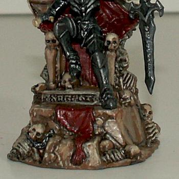 Skeleton Lord on Throne of Bones by Chocolate Thief
