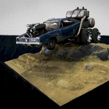 MAD MAX TRUCK BOUNCES ALONG THROUGH THE DESERT by Jeanette