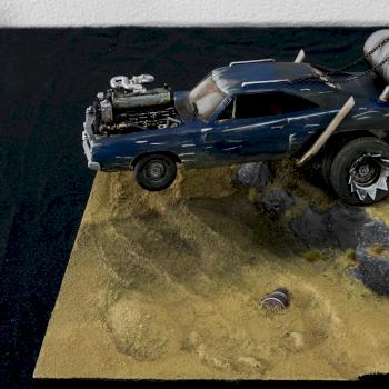 MAD MAX TRUCK BOUNCES ALONG THROUGH THE DESERT by Jeanette