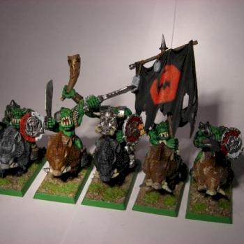 orcs on wild pigs by mushroom