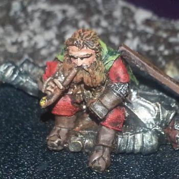 Gimli on Dead Uruk Hai by miniatureman