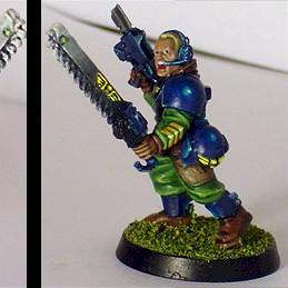W40K imperial soldier with blue armor and chainsaw by Delfiris