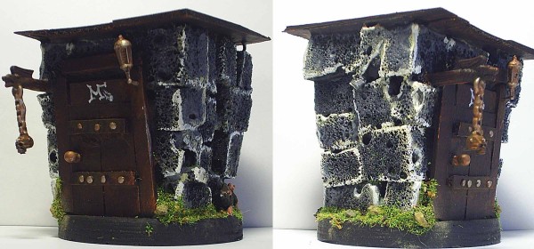 mordheim building by bretonian man