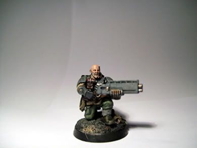 Veteran Sergeant with shotgun by new
