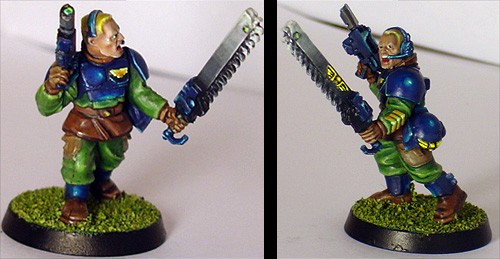 W40K imperial soldier with blue armor and chainsaw by Delfiris